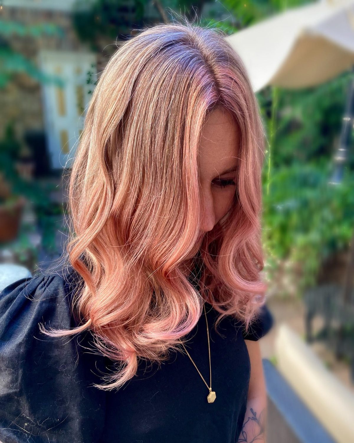 Balayage lightener processing on brunette hair at Fluff Denver